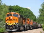 090531001 Triple set of Swoosh GEVOs lead eastbound BNSF "junk" train on Wayzata Sub.